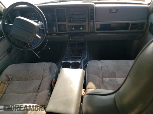 1996 Jeep Cherokee SE with VIN 1J4FT28S3TL197827, listed as a Copart auction lot 75443574 with 116,660 mi miles and Salvage Title. Bid and sale history available at carsss.com. Image 8.