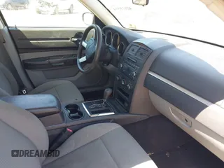 2008 Dodge Charger with VIN 2B3KA43R58H144448, listed as a IAAI auction lot 42015594 with 199,886 mi miles and . Bid and sale history available at carsss.com. Image 5.