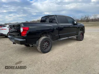 2018 Nissan Titan XD SV with VIN 1N6BA1F41JN515743, listed as a Copart auction lot 41860755 with 122,932 mi miles and Clean Title. Bid and sale history available at carsss.com. Image 4.
