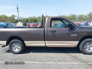 2020 Ram 1500 Tradesman with VIN 3C6JR6DG4LG133162, listed as a IAAI auction lot 42157040 with 84,737 mi miles and . Bid and sale history available at DreamBid. Image 13.