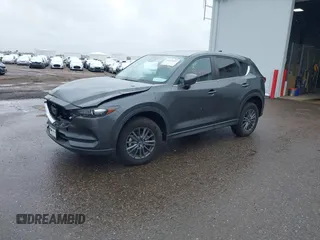 2021 Mazda CX-5 Touring with VIN JM3KFBCM8M0311433, listed as a IAAI auction lot 40554094 with 23,319 mi miles. Bid and sale history available at carsss.com. Image 17.