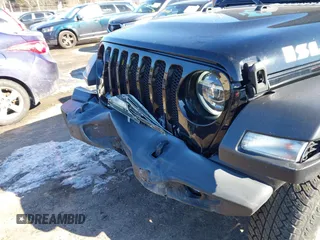 2021 Jeep Wrangler 80th Anniversary with VIN 1C4GJXAN0MW557797, listed as a IAAI auction lot 41505457 with 40,611 mi miles and . Bid and sale history available at DreamBid. Image 6.