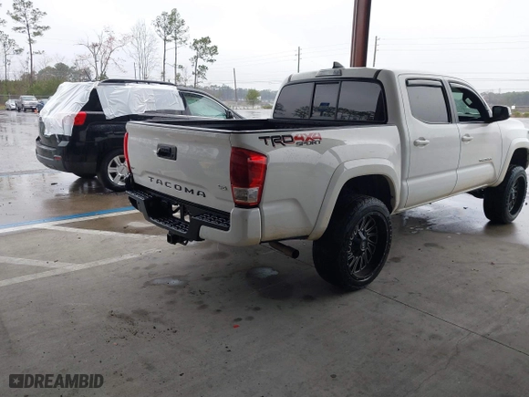 2016 Toyota Tacoma SR with VIN 5TFCZ5AN3GX039919, listed as a IAAI auction lot 41607382 with 107,703 mi miles. Bid and sale history available at carsss.com. Image 4.