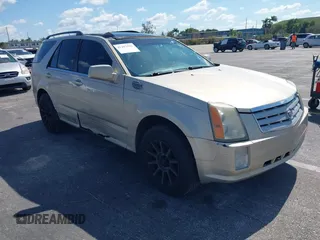 2008 Cadillac SRX AWD with VIN 1GYEE637280101842, listed as a IAAI auction lot 41417596 with 125,052 mi miles. Bid and sale history available at carsss.com. Image 1.