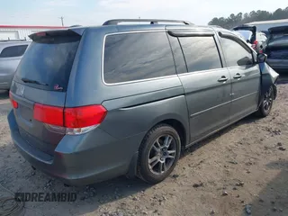 2010 Honda Odyssey EX-L with VIN 5FNRL3H7XAB099821, listed as a IAAI auction lot 41680729 with 217,458 mi miles and . Bid and sale history available at DreamBid. Image 4.