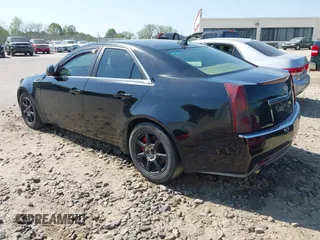 2009 Cadillac CTS RWD w/1SA with VIN 1G6DF577390128796, listed as a IAAI auction lot 42078153 with 257,757 mi miles. Bid and sale history available at carsss.com. Image 3.