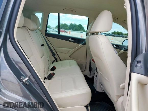 2014 Volkswagen Tiguan SEL с VIN WVGAV3AX7EW506170, выставлен на аукционе Copart как лот 58852355 с пробегом 55 961 миль миль и Списание • Salvage title. История ставок и продаж доступна на DreamBid. Изображение 11.