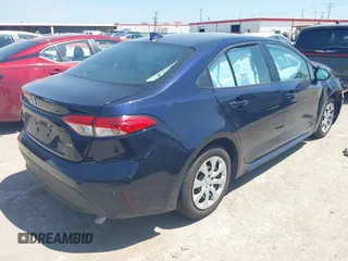2023 Toyota Corolla LE with VIN 5YFB4MDE8PP033659, listed as a IAAI auction lot 42020847 with 42,624 mi miles. Bid and sale history available at carsss.com. Image 4.