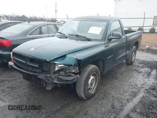 1999 Dodge Dakota SLT with VIN 1B7FL26XXXS209424, listed as a IAAI auction lot 41264544 with 70,523 mi miles. Bid and sale history available at carsss.com. Image 2.