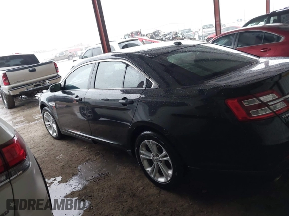 2015 Ford Taurus SEL z VIN 1FAHP2E87FG203272, wystawiony jako IAAI lot #41717231 z przebiegiem 95 829 mil mil oraz . Historia ofert i sprzedaży dostępna na DreamBid. Obrazek 14.