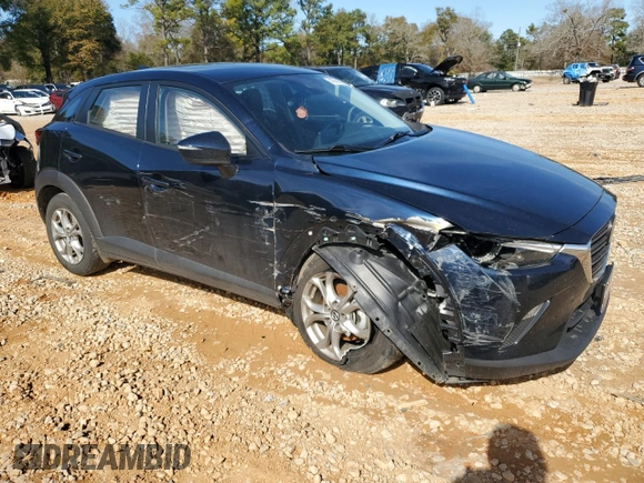 2021 Mazda CX-3 Sport with VIN JM1DKDB78M1515924, listed as a Copart auction lot 43688325 with 56,271 mi miles and Salvage Title. Bid and sale history available at carsss.com. Image 4.