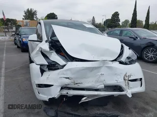 2024 Tesla Model Y with VIN 7SAYGDED6RF166543, listed as a IAAI auction lot 41713362 with Not Provided miles and . Bid and sale history available at DreamBid. Image 1.