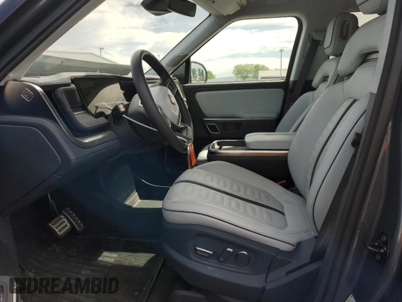 2023 Rivian R1S Adventure z VIN 7PDSGABA5PN010593, wystawiony jako Copart lot #52508835 z przebiegiem 16 962 mil mil oraz Szkody całkowita. Historia ofert i sprzedaży dostępna na DreamBid. Obrazek 7.