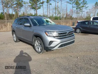 2022 Volkswagen Atlas SE z VIN 1V2WP2CA6NC558395, wystawiony jako IAAI lot #41697571 z przebiegiem 62 101 mil mil oraz . Historia ofert i sprzedaży dostępna na DreamBid. Obrazek 1.