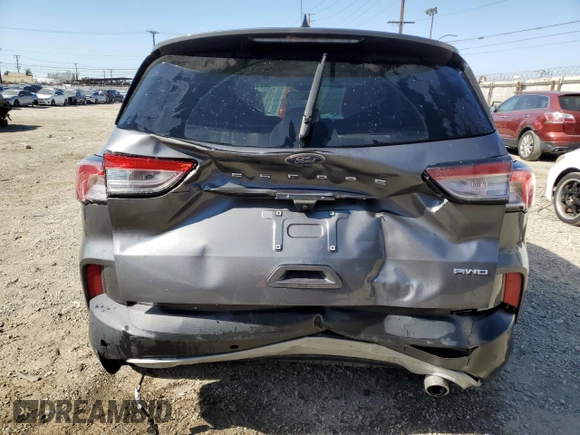 2021 Ford Escape S with VIN 1FMCU9F67MUA85608, listed as a Copart auction lot 52105335 with 20,140 mi miles and Non Repairable. Bid and sale history available at DreamBid. Image 6.