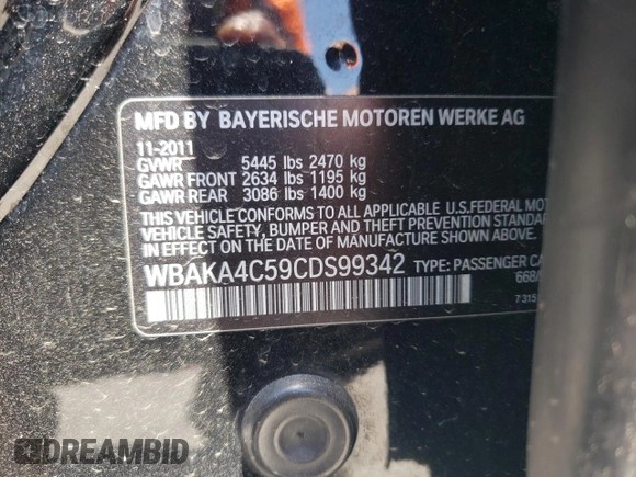 2012 BMW 7 Series 740i with VIN WBAKA4C59CDS99342, listed as a Copart auction lot 63705894 with 0 mi miles and Salvage Title. Bid and sale history available at carsss.com. Image 13.