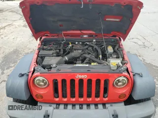 2008 Jeep Wrangler Rubicon with VIN 1J8GA641X8L586923, listed as a Copart auction lot 56243405 with 93,173 mi miles and Salvage title. Bid and sale history available at DreamBid. Image 12.