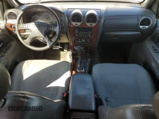 2003 GMC Envoy SLT z VIN 1GKET16S736179347, wystawiony jako Copart lot #52370775 z przebiegiem 230 623 mil mil oraz Szkoda całkowita • Salvage title. Historia ofert i sprzedaży dostępna na DreamBid. Obrazek 8.