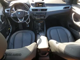 2016 BMW X1 xDrive28i with VIN WBXHT3C32G5E52052, listed as a Copart auction lot 79522024 with 76,995 mi miles and Salvage Title. Bid and sale history available at carsss.com. Image 8.