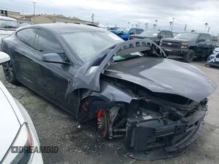 2020 Tesla Model S Performance with VIN 5YJSA1E47LF415636, listed as a IAAI auction lot 41666553 with 50,858 mi miles and . Bid and sale history available at DreamBid. Image 1.