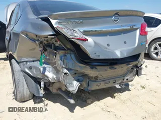 2014 Nissan Sentra S with VIN 3N1AB7AP1EY310161, listed as a IAAI auction lot 39171934 with 97,301 mi miles and . Bid and sale history available at DreamBid. Image 6.