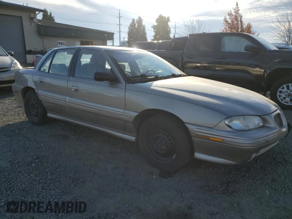 1996 Pontiac Grand Am SE2 with VIN 1G2NE52T3TC834038, listed as a Copart auction lot 76610794 with 140,379 mi miles and Salvage Title. Bid and sale history available at carsss.com. Image 4.