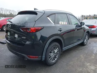 2017 Mazda CX-5 Sport with VIN JM3KFABL6H0213672, listed as a IAAI auction lot 41721128 with 100,266 mi miles. Bid and sale history available at carsss.com. Image 4.