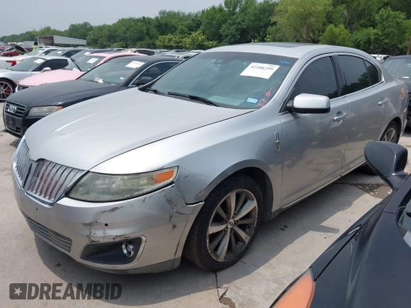 2009 Lincoln MKS с VIN 1LNHM94R99G611617, выставлен на аукционе IAAI как лот 42288299 с пробегом 115 320 миль миль и . История ставок и продаж доступна на DreamBid. Изображение 2.