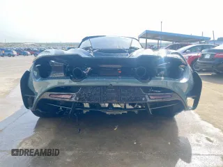 2018 McLaren 720S z VIN SBM14DCA3JW001315, wystawiony jako Copart lot #78193064 z przebiegiem Nie podano mil oraz Szkody całkowita. Historia ofert i sprzedaży dostępna na DreamBid. Obrazek 6.