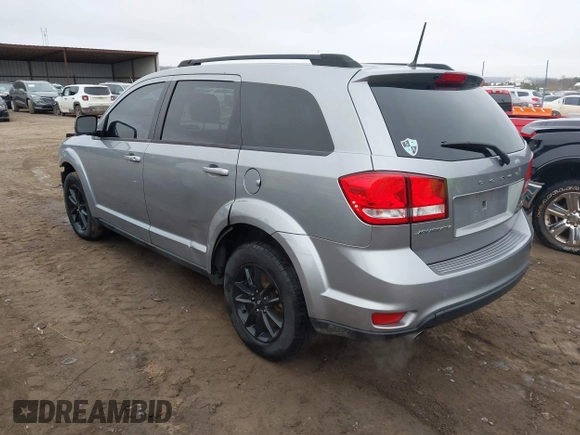 2019 Dodge Journey SE with VIN 3C4PDCBG9KT869149, listed as a IAAI auction lot 41472289 with 97,333 mi miles and . Bid and sale history available at DreamBid. Image 3.