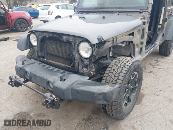 2014 Jeep Wrangler Unlimited Sport with VIN 1C4BJWDG7EL244749, listed as a IAAI auction lot 41871127 with 128,420 mi miles and . Bid and sale history available at DreamBid. Image 18.