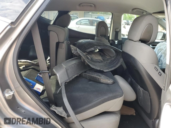 2018 Hyundai Santa Fe 2.4L z VIN 5NMZTDLB9JH079656, wystawiony jako Copart lot #54256175 z przebiegiem 100 678 mil mil oraz Szkoda całkowita • Salvage title. Historia ofert i sprzedaży dostępna na DreamBid. Obrazek 11.