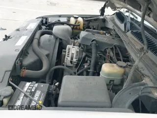 2000 Chevrolet Suburban LT z VIN 3GNFK16T6YG225016, wystawiony jako IAAI lot #41702840 z przebiegiem 271 832 mil mil oraz . Historia ofert i sprzedaży dostępna na DreamBid. Obrazek 12.