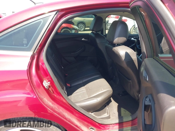 2013 Ford Focus Titanium with VIN 1FADP3J23DL334161, listed as a IAAI auction lot 41987758 with 117,665 mi miles and . Bid and sale history available at carsss.com. Image 8.