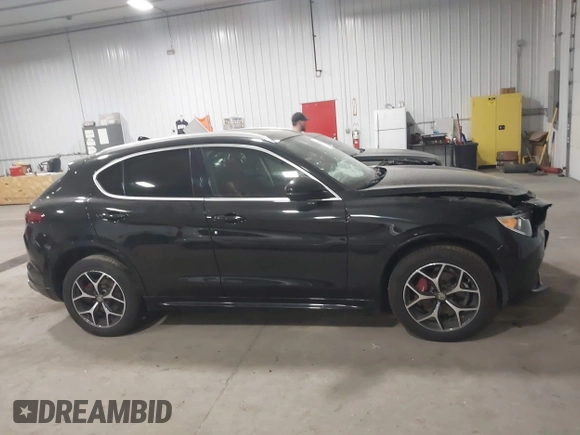 2020 Alfa Romeo Stelvio Ti z VIN ZASPAKBN5L7C91663, wystawiony jako IAAI lot #41816765 z przebiegiem 40 972 mil mil oraz . Historia ofert i sprzedaży dostępna na DreamBid. Obrazek 13.