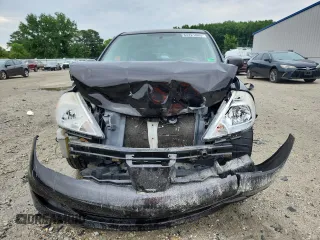 2010 Nissan Versa SL with VIN 3N1BC1CP1AL458944, listed as a Copart auction lot 64221065 with 131,163 mi miles and Salvage title. Bid and sale history available at DreamBid. Image 5.