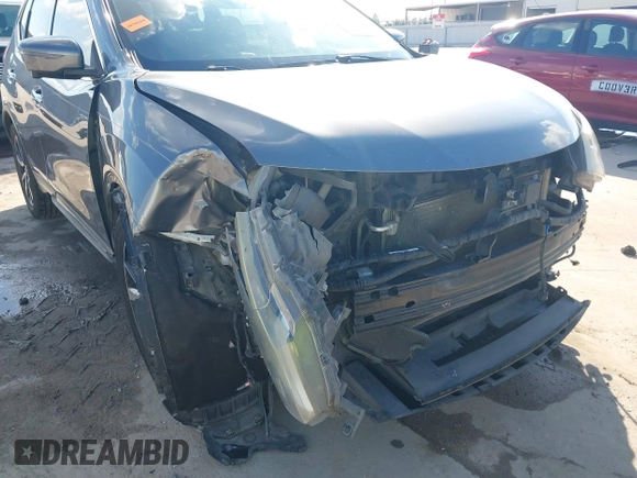 2017 Nissan Rogue SL with VIN 5N1AT2MT2HC859544, listed as a IAAI auction lot 40773928 with 200,265 mi miles and . Bid and sale history available at DreamBid. Image 6.