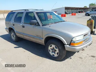 2003 Chevrolet Blazer LS z VIN 1GNDT13X63K146670, wystawiony jako IAAI lot #42200426 z przebiegiem 129 516 mil mil oraz . Historia ofert i sprzedaży dostępna na DreamBid. Obrazek 1.