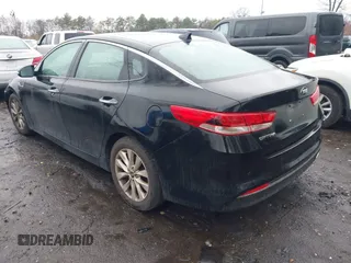 2018 Kia Optima LX with VIN 5XXGT4L38JG271181, listed as a IAAI auction lot 41911480 with 59,010 mi miles and . Bid and sale history available at carsss.com. Image 3.