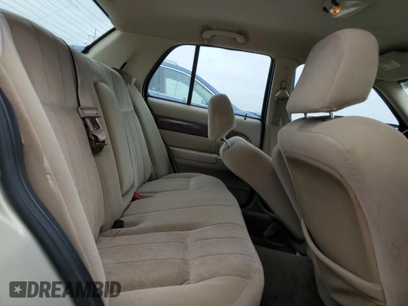2004 Mercury Grand Marquis GS with VIN 2MEFM74W44X659873, listed as a Copart auction lot 51793205 with 115,384 mi miles and Salvage Title. Bid and sale history available at DreamBid. Image 10.