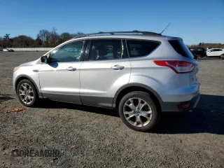 2014 Ford Escape SE with VIN 1FMCU9GX1EUA72894, listed as a Copart auction lot 81632224 with 168,936 mi miles and Clean Title. Bid and sale history available at DreamBid. Image 2.