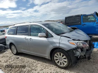 2015 Toyota Sienna Limited z VIN 5TDDK3DC5FS127754, wystawiony jako Copart lot #57437715 z przebiegiem 99 496 mil mil oraz Szkoda całkowita • Salvage title. Historia ofert i sprzedaży dostępna na DreamBid. Obrazek 4.