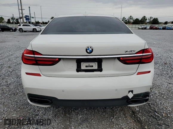 2016 BMW 7 Series 740i with VIN WBA7E2C52GG547112, listed as a Copart auction lot 63069355 with 76,867 mi miles and Salvage title. Bid and sale history available at DreamBid. Image 6.
