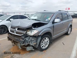 2018 Dodge Journey SXT z VIN 3C4PDCBB0JT361784, wystawiony jako IAAI lot #42172506 z przebiegiem 135 273 mil mil oraz . Historia ofert i sprzedaży dostępna na DreamBid. Obrazek 2.