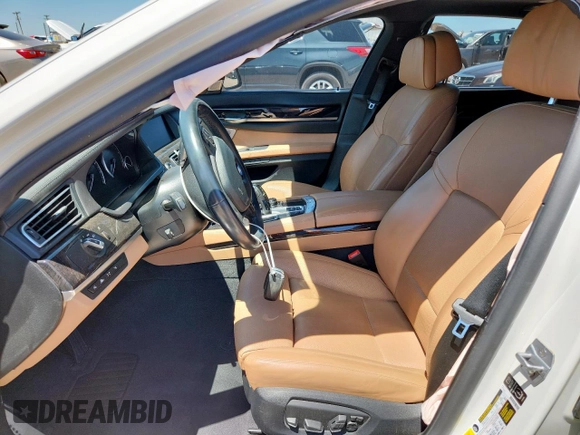 2013 BMW 7 Series 750Li с VIN WBAYE8C59DD134172, выставлен на аукционе Copart как лот 63624785 с пробегом 73 185 миль миль и Списание • Salvage title. История ставок и продаж доступна на DreamBid. Изображение 7.