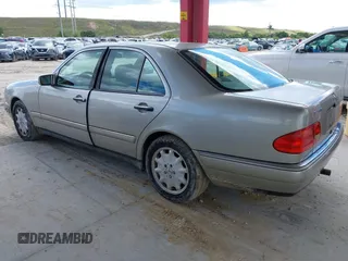 1998 Mercedes-Benz E 320 with VIN WDBJF25F5WA581878, listed as a IAAI auction lot 41662418 with 154,886 mi miles and . Bid and sale history available at DreamBid. Image 3.