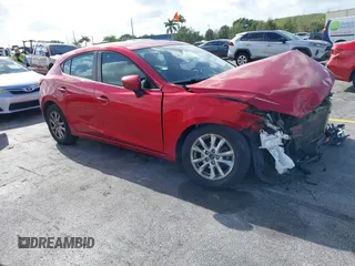 2015 Mazda 3 i Touring with VIN 3MZBM1L76FM203277, listed as a IAAI auction lot 41943139 with 102,056 mi miles. Bid and sale history available at carsss.com. Image 1.