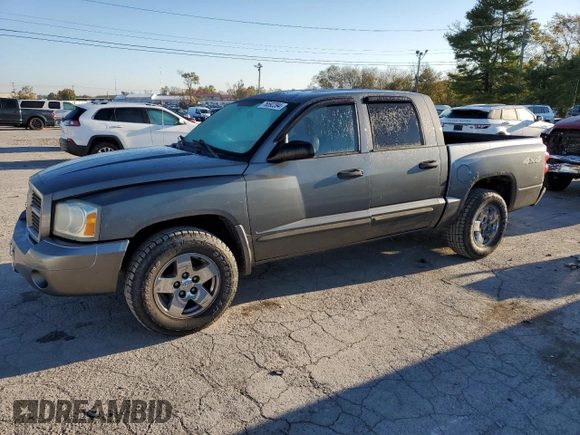 2006 Dodge Dakota SLT with VIN 1D7HW48K46S624630, listed as a Copart auction lot 76592394 with 135,679 mi miles and Salvage Title. Bid and sale history available at carsss.com. Image 1.