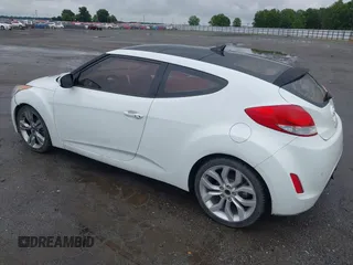 2012 Hyundai Veloster w/Gray Int с VIN KMHTC6ADXCU074298, выставлен на аукционе IAAI как лот 42353923 с пробегом 129 114 миль миль и . История ставок и продаж доступна на DreamBid. Изображение 3.