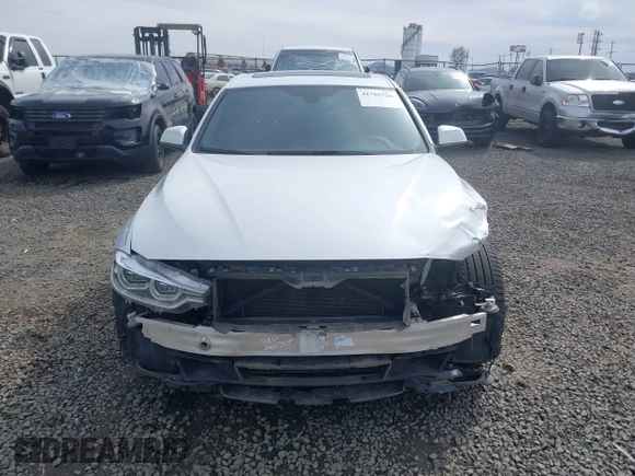 2018 BMW 3 Series 330i xDrive with VIN WBA8D9G50JNU72780, listed as a IAAI auction lot 41763726 with 65,225 mi miles and . Bid and sale history available at DreamBid. Image 13.